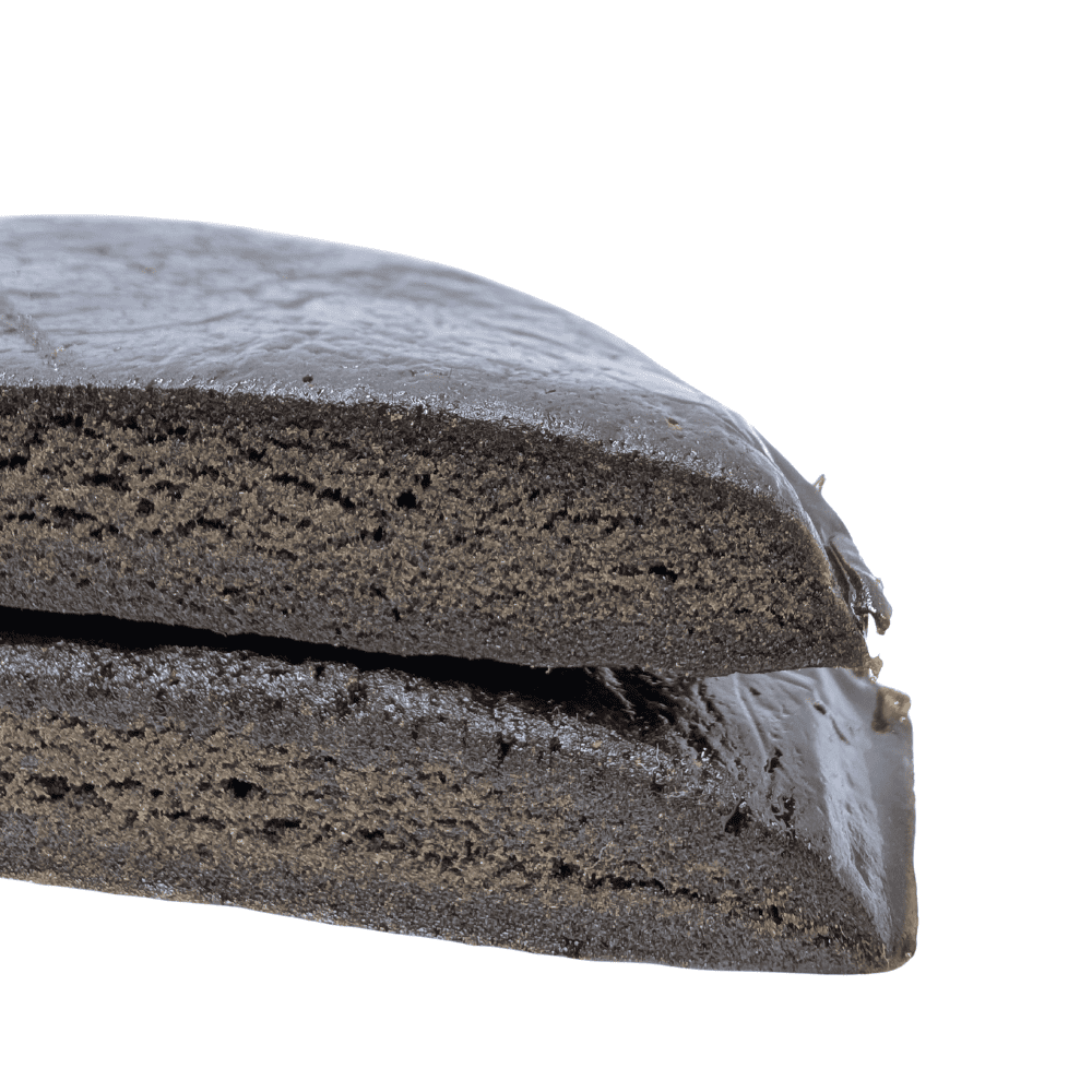 Détail de la coupe de la résine NL-1 Black Afghan 40% NL-1 Suisse montrant la texture intérieure